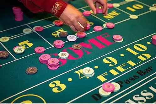 Live blackjack dealer table on mobile screen showing card layout